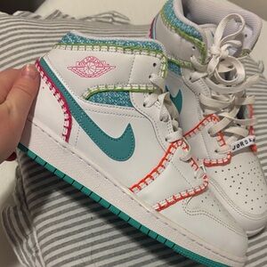 Jordan White and Teal High-Top Sneakers